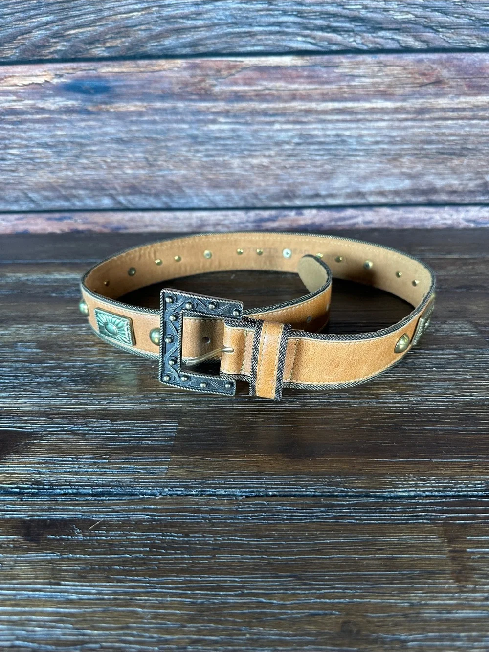 Streets Ahead women’s tan belt with stunning gold accents!